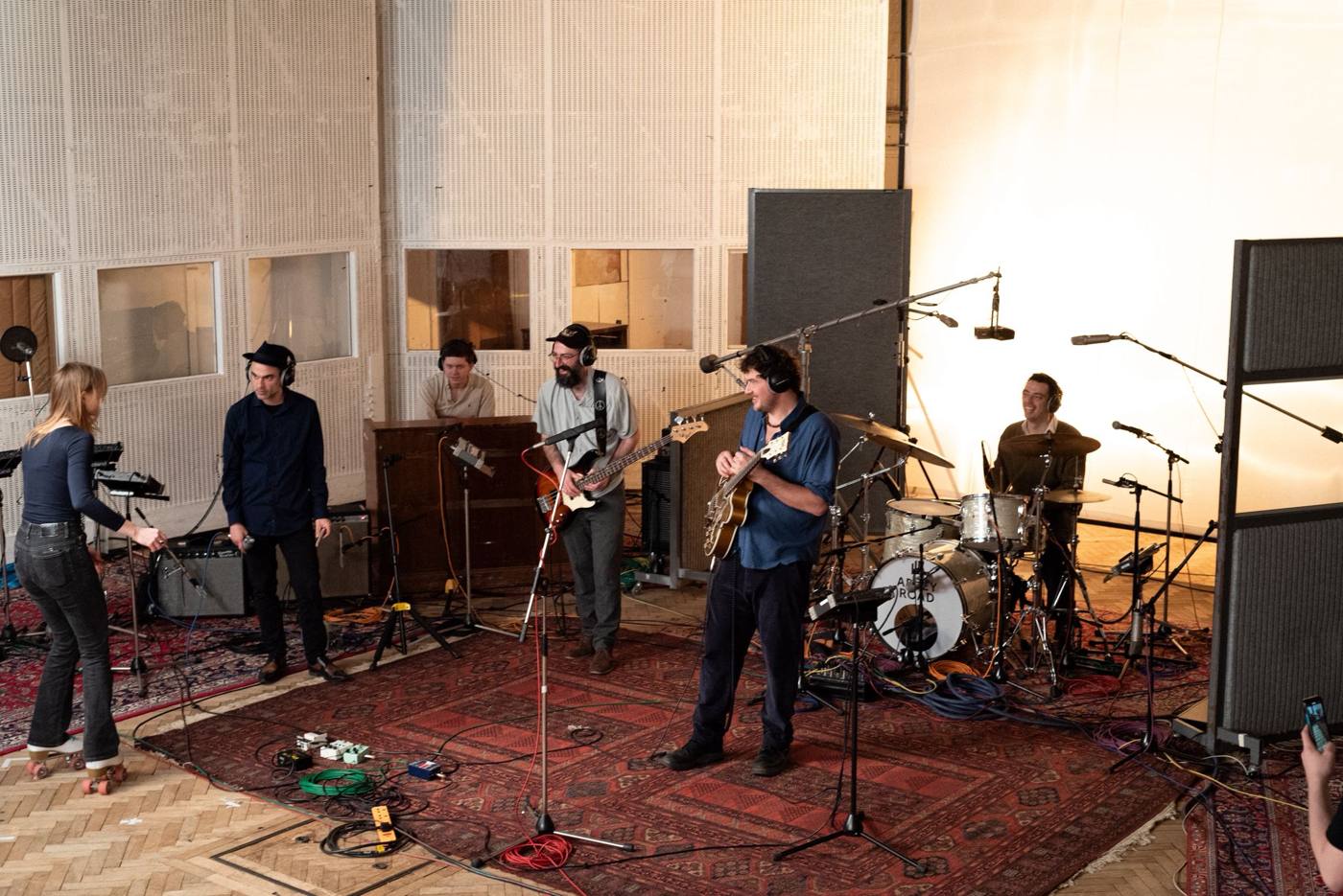 Marco Farris with the band in the live room of a recording studio